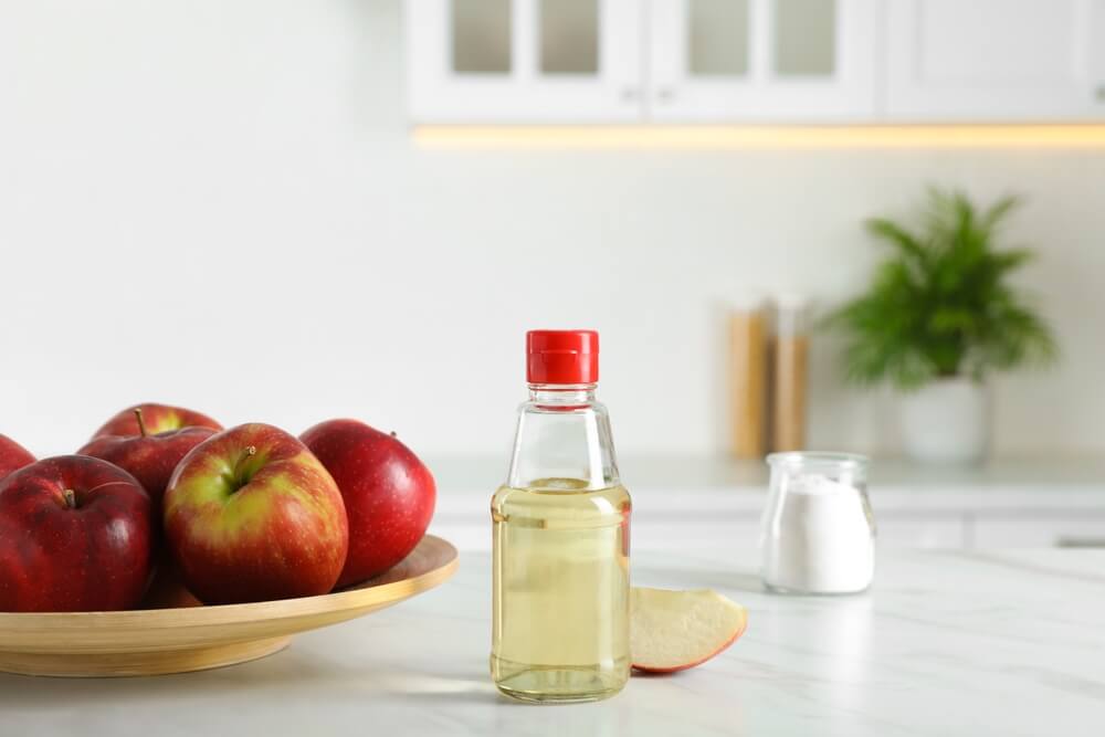 Apple,Vinegar,And,Baking,Soda,On,White,Marble,Table,In